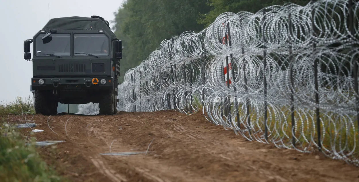 З-за сітуацыі з мігрантамі Польшча ўвяла на мяжы з Беларуссю надзвычайнае становішча​ / Reuters&nbsp;