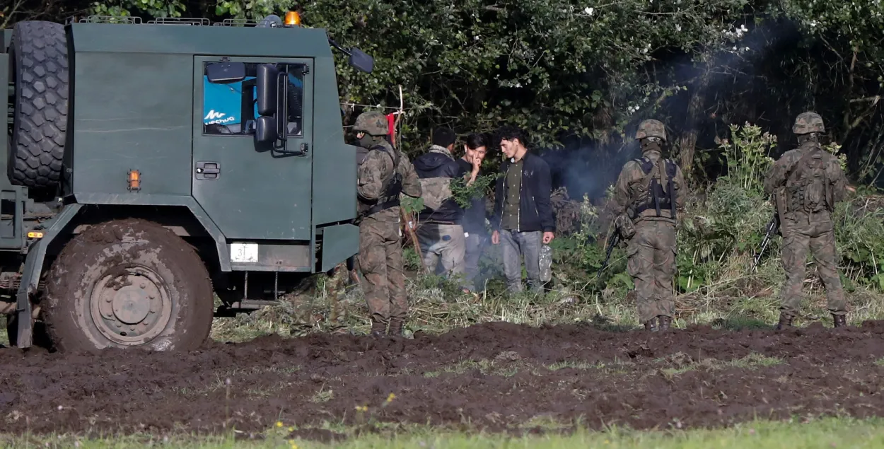 Нелегальныя мігранты на польска-беларускай мяжы​ / Reuters