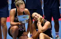 Elise Mertens (left) and Aryna Sabalenka / Reuters