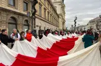 Белорусы в Варшаве пришли на марш "Не мой выбор", чтобы напомнить о фальсификациях президентских выборов в Беларуси
